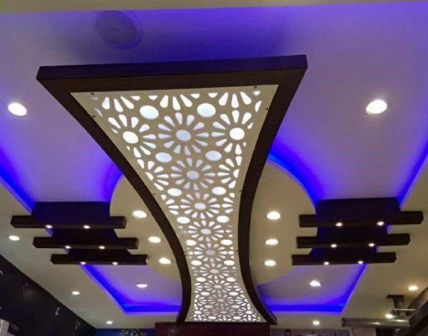 POP False Ceiling with Acrylic Floral Jali Design Highlighted with Recessed & Cove Lights